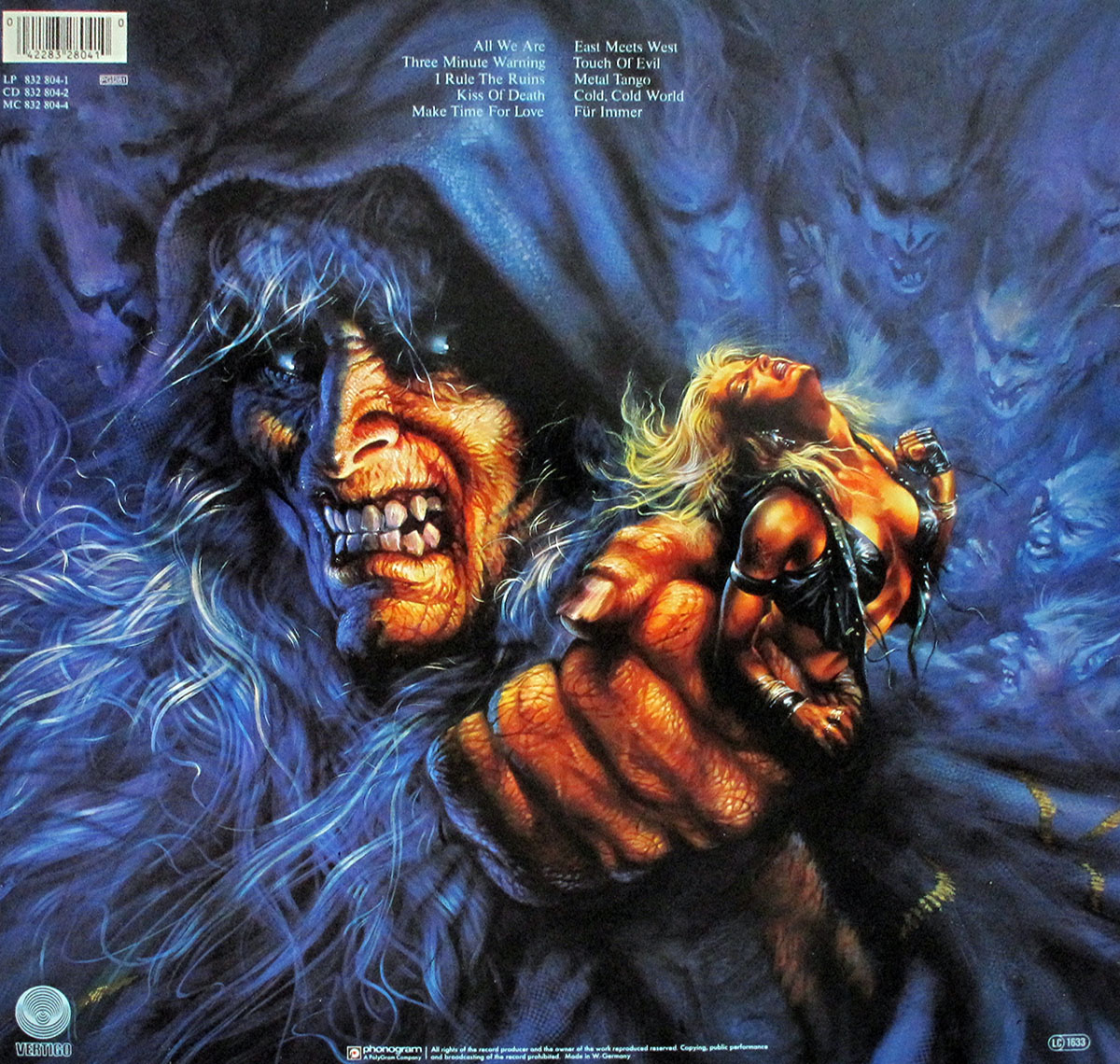 Back cover of Warlock’s 1987 album Triumph and Agony, West German Vertigo pressing. The artwork continues the dramatic fantasy theme: a monstrous cloaked figure with fiery eyes and snarling teeth clutches Doro Pesch in its oversized hand, her head thrown back in defiance. Behind them, ghostly faces and demonic forms swirl in blue shadows. The track listing for the album appears at the top left in white text, while label logos and credits sit at the bottom.